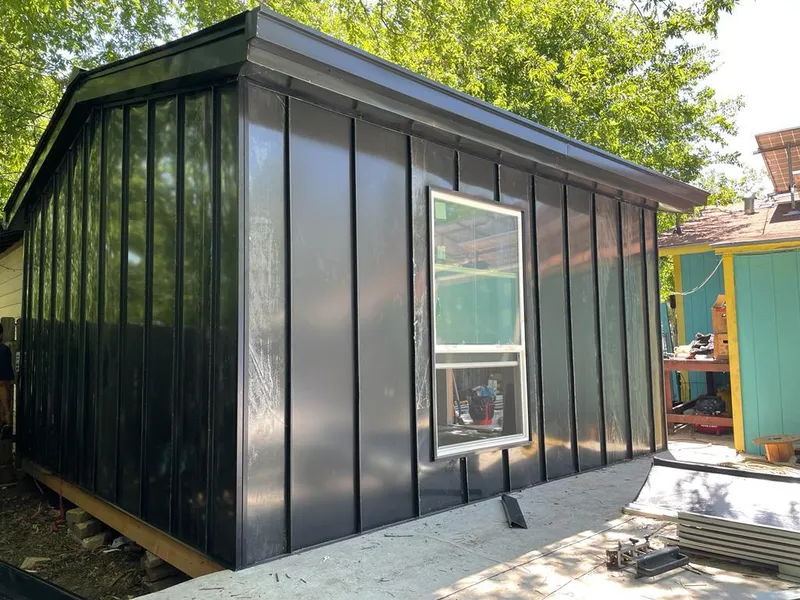 Black standing seam metal wall panels for Roof Inspection in Calabasas